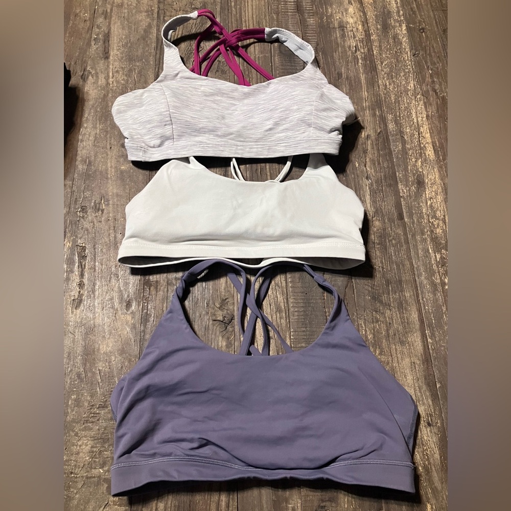 Lot of 3 strappy Lululemon and Born Primitive Sports bras! Size 12 and XL